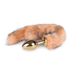 Medium goudkleurige buttplug met gestreepte vossenstaart